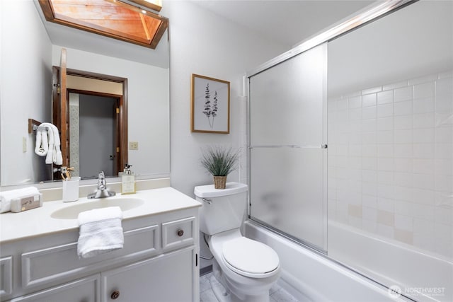 1102 S Villard St, Tacoma, WA 98465 - bathroom featuring toilet, vanity, and combined bath / shower with glass door
