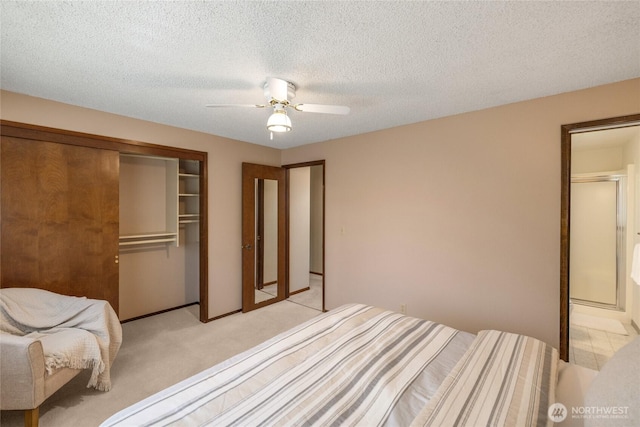 1102 S Villard St, Tacoma, WA 98465 - bedroom with light carpet, a closet, a ceiling fan, and a textured ceiling