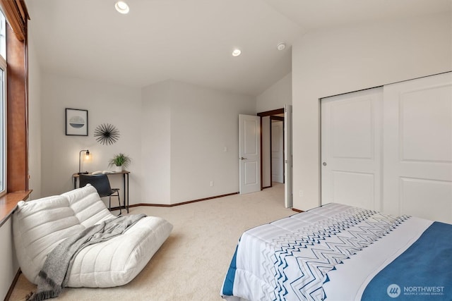 bedroom featuring light carpet, vaulted ceiling, recessed lighting, a closet, and baseboards