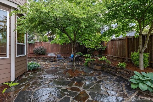 view of patio / terrace featuring a fenced backyard