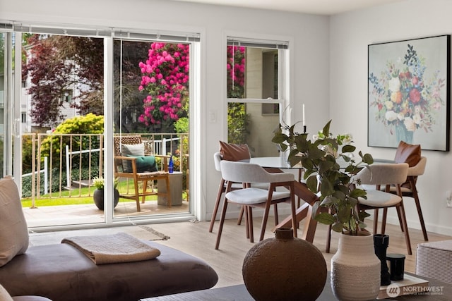 doorway to outside featuring wood finished floors