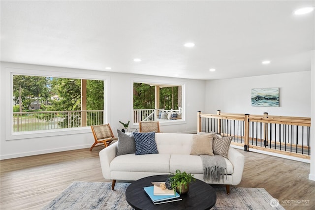 2419 Rocky Point Rd NW, Bremerton, WA 98312 - living area featuring wood finished floors, recessed lighting, and baseboards