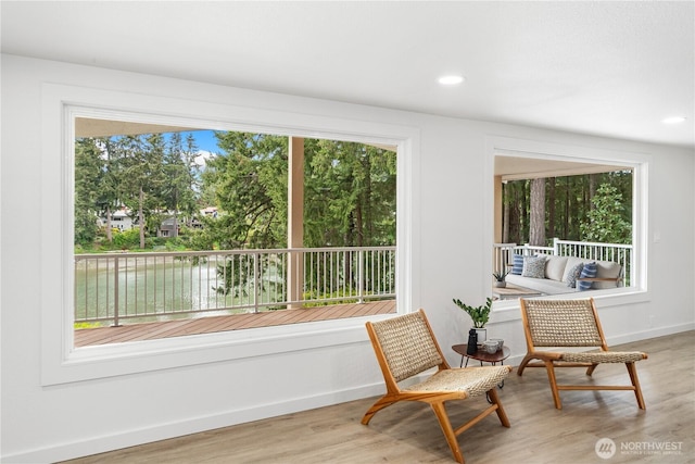 2419 Rocky Point Rd NW, Bremerton, WA 98312 - sitting room with wood finished floors and baseboards