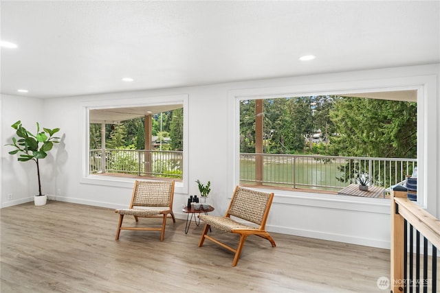 2419 Rocky Point Rd NW, Bremerton, WA 98312 - sitting room featuring wood finished floors, plenty of natural light, baseboards, and recessed lighting
