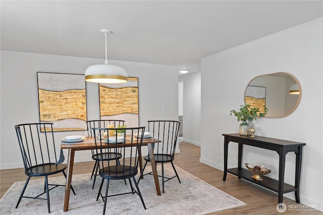 2419 Rocky Point Rd NW, Bremerton, WA 98312 - dining space featuring wood finished floors and baseboards