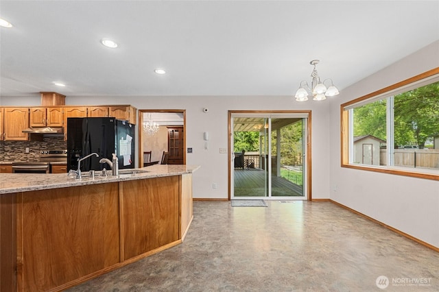 995 S Miner St, Colville, WA 99114 - kitchen featuring stainless steel range with electric cooktop, freestanding refrigerator, a chandelier, baseboards, and recessed lighting