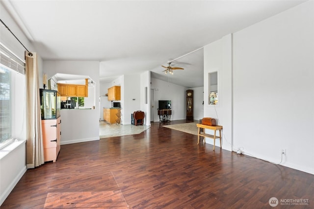 5211 S Aspen, Spokane, WA 99224 - unfurnished living room with wood finished floors, plenty of natural light, lofted ceiling, a ceiling fan, and baseboards