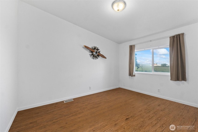 5211 S Aspen, Spokane, WA 99224 - unfurnished room with wood finished floors and baseboards