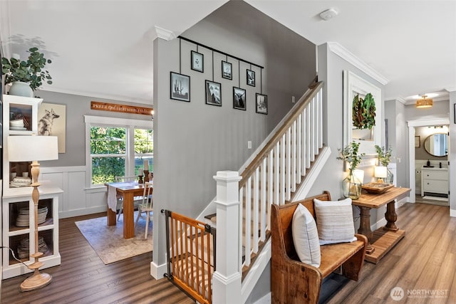 191 E Sterling Dr, Allyn, WA 98524 - stairs featuring wood finished floors and ornamental molding