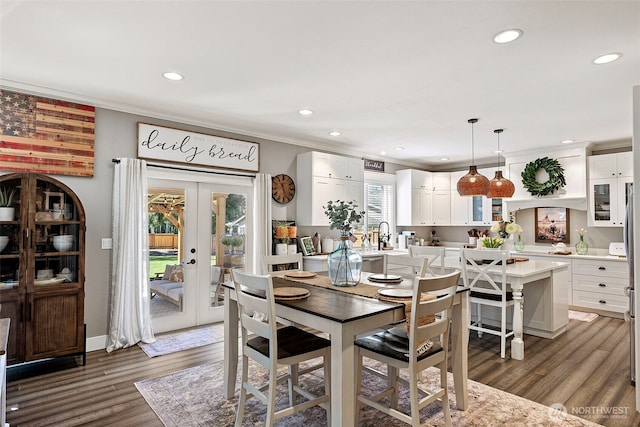 191 E Sterling Dr, Allyn, WA 98524 - dining space with recessed lighting, ornamental molding, wood finished floors, and french doors