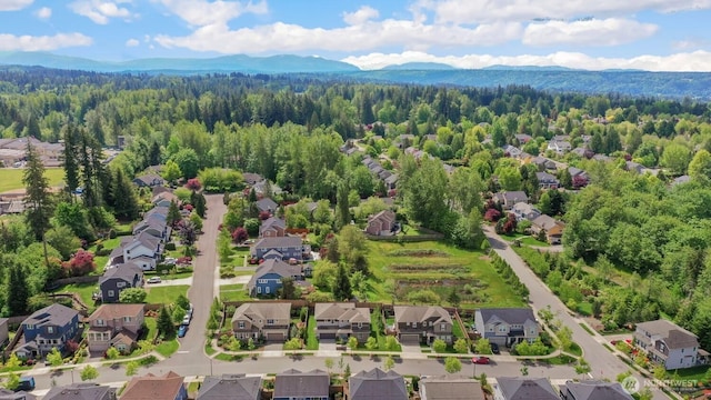 28611 NE 155th St, Duvall, WA 98019 - aerial view of residential area with a mountainous background and a forest