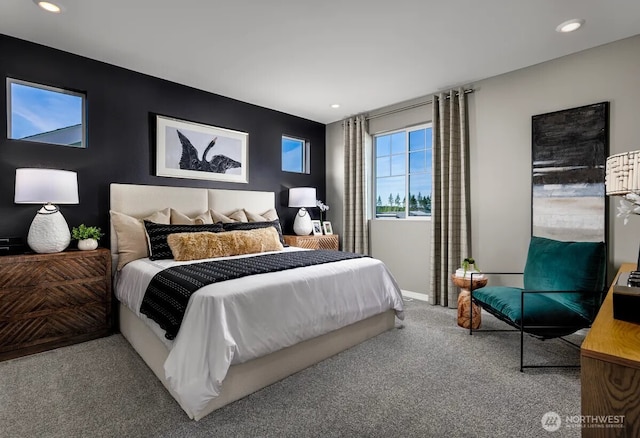 carpeted bedroom featuring recessed lighting and baseboards