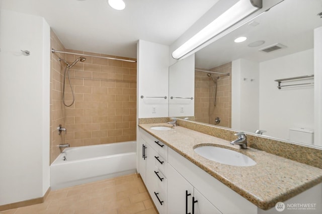 full bathroom featuring shower / washtub combination and double vanity