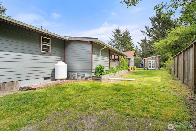 view of property exterior with crawl space and an outbuilding