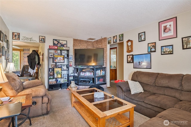 1016 Oak, Kelso, WA 98626 - carpeted living area with a textured ceiling
