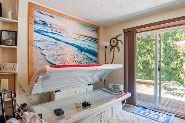 1016 Oak, Kelso, WA 98626 - miscellaneous room featuring a textured ceiling and wood finished floors