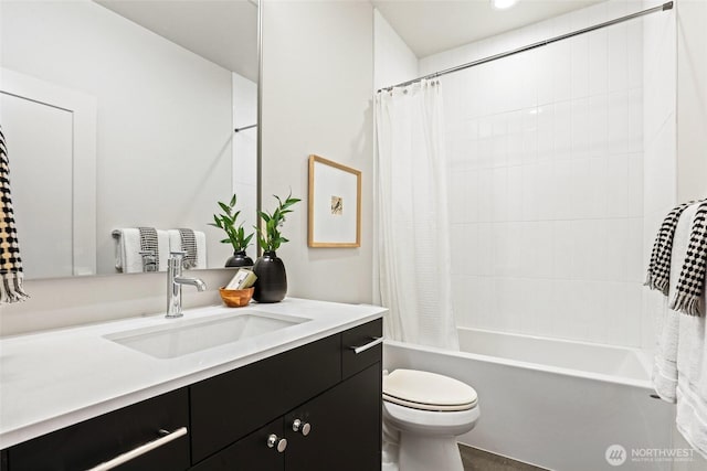 9752A Holman Rd NW, Seattle, WA 98117 - bathroom featuring vanity, shower / bath combo with shower curtain, toilet, and recessed lighting