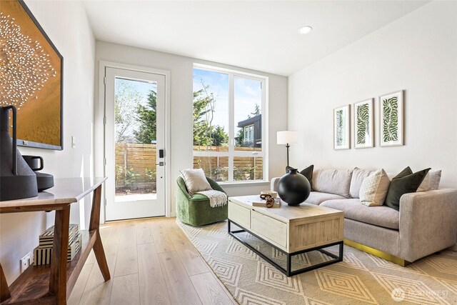 9752A Holman Rd NW, Seattle, WA 98117 - living room featuring plenty of natural light, light wood-style flooring, and recessed lighting