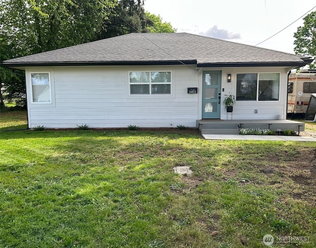 3403 Xavier Ave, Vancouver, WA 98660 - view of front facade with a shingled roof and a front yard