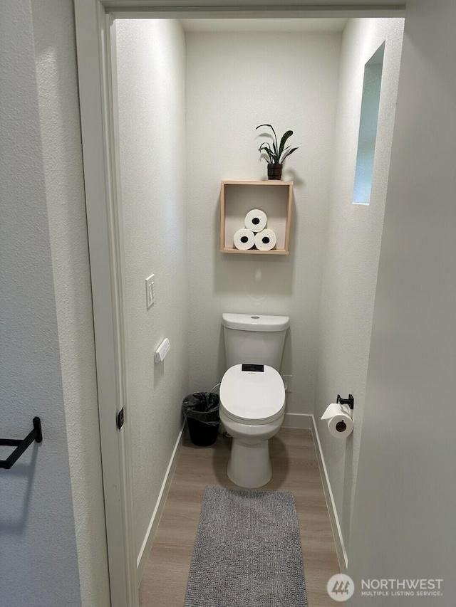 3403 Xavier Ave, Vancouver, WA 98660 - bathroom with toilet, wood finished floors, and baseboards
