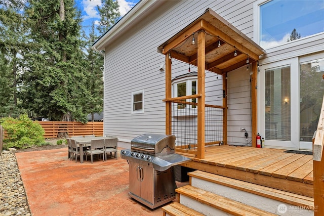 60 Spruce Ln, Ronald, WA 98940 - wooden deck with fence, outdoor dining space, and a patio area