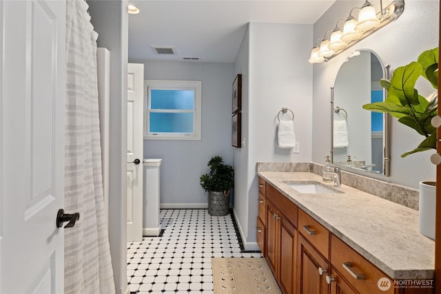 60 Spruce Ln, Ronald, WA 98940 - bathroom with vanity, baseboards, and tile patterned flooring