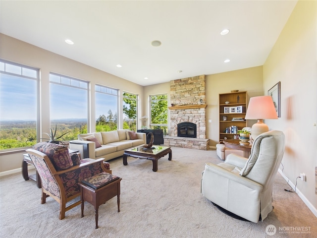 8144 Todderjen Ln SW, Olympia, WA 98512 - living room with carpet, a stone fireplace, baseboards, and recessed lighting