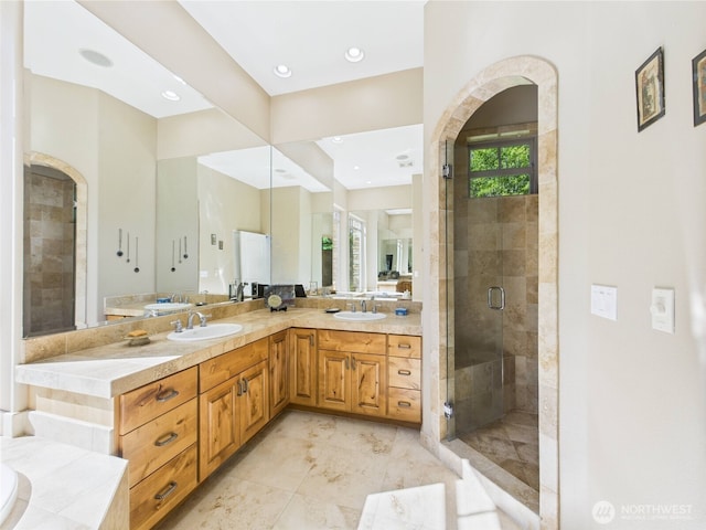 8144 Todderjen Ln SW, Olympia, WA 98512 - full bath featuring a stall shower, double vanity, and recessed lighting