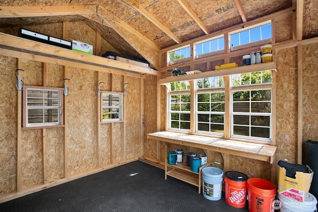 unfurnished sunroom with vaulted ceiling and plenty of natural light