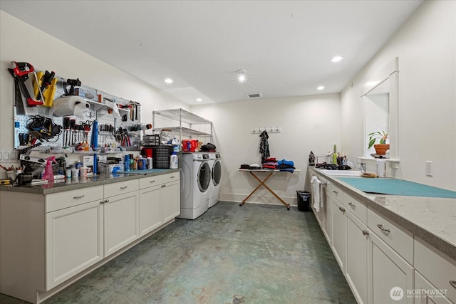 4504 37th Ave NE, Seattle, WA 98105 - laundry area with separate washer and dryer and recessed lighting
