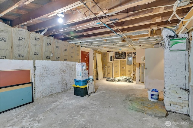 unfinished below grade area featuring electric panel