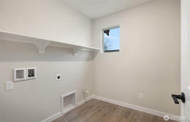 26539 NE 143rd Cir Unit E, Duvall, WA 98019 - laundry area featuring hookup for an electric dryer, hookup for a washing machine, wood finished floors, and baseboards