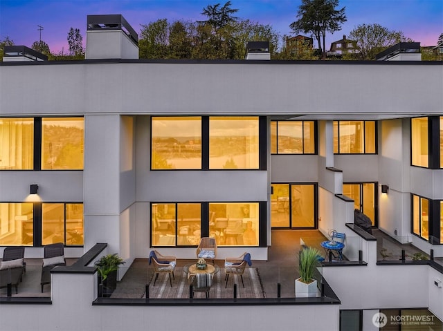 2400 Aurora Ave N Unit 202, Seattle, WA 98109 - rear view of property with a chimney