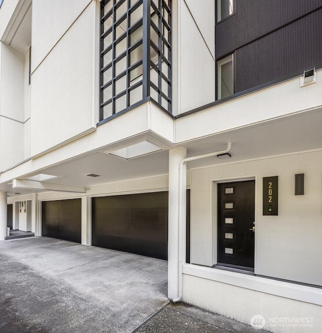 2400 Aurora Ave N Unit 202, Seattle, WA 98109 - view of side of property with an attached garage