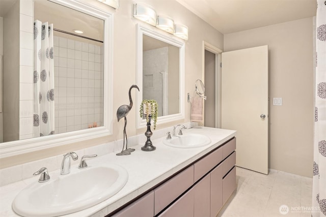2400 Aurora Ave N Unit 202, Seattle, WA 98109 - bathroom featuring double vanity, curtained shower, and tile patterned flooring
