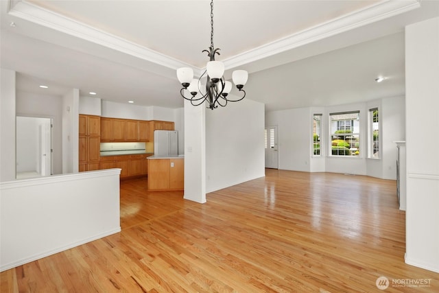 5007 70th Avenue Ct W Unit 7A, University Place, WA 98467 - unfurnished dining area featuring light wood-style floors, recessed lighting, a chandelier, a raised ceiling, and ornamental molding