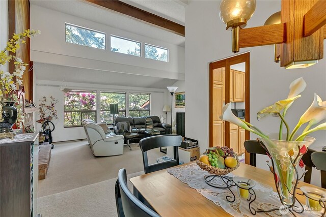 15915 SE 166th Pl, Renton, WA 98058 - dining area featuring carpet and a high ceiling