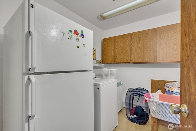 15915 SE 166th Pl, Renton, WA 98058 - clothes washing area with washer / dryer and cabinet space
