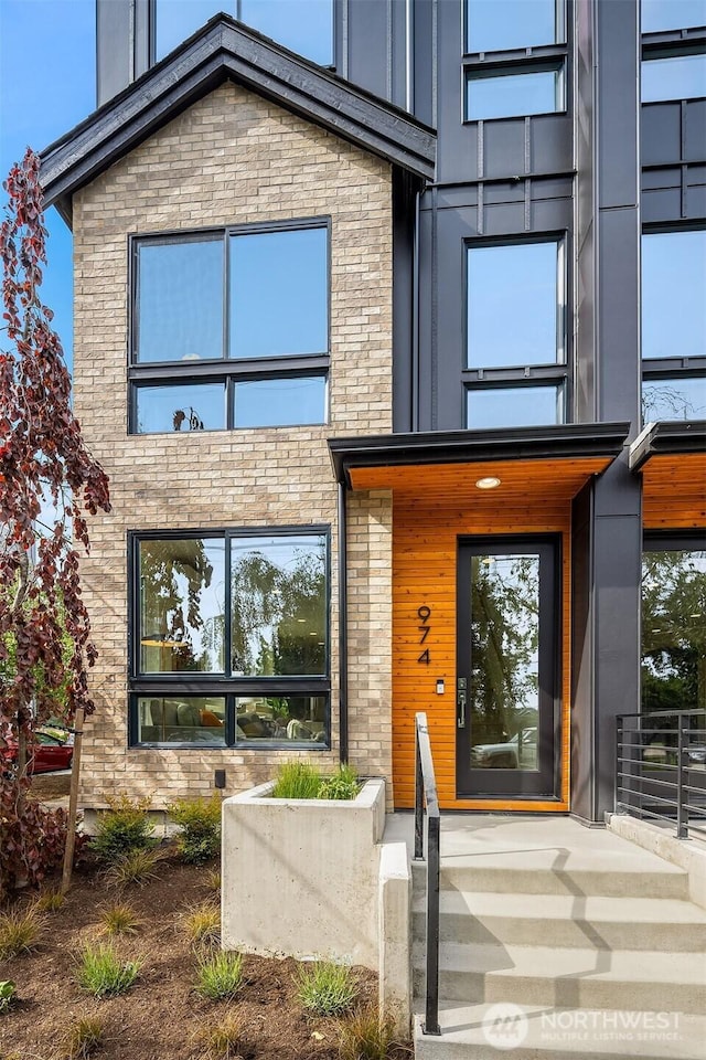 972 NW 54th St, Seattle, WA 98107 - property entrance featuring board and batten siding