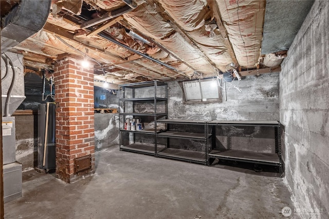 unfinished basement with water heater
