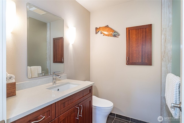1503 Z St, Port Townsend, WA 98368 - bathroom with toilet, tile patterned floors, and vanity