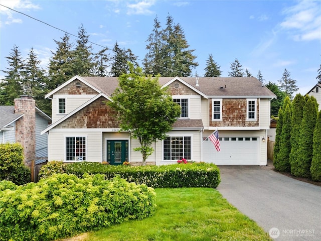 22431 82nd Ave W, Edmonds, WA 98026 - view of front of house with asphalt driveway, an attached garage, and roof with shingles