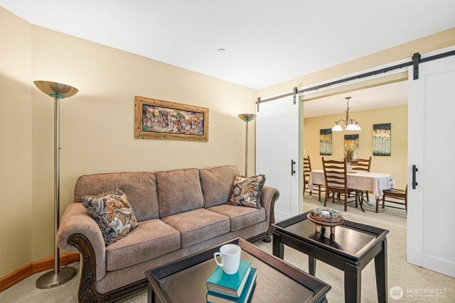 17322 SE 218th St, Kent, WA 98042 - living room with a barn door, light colored carpet, and baseboards