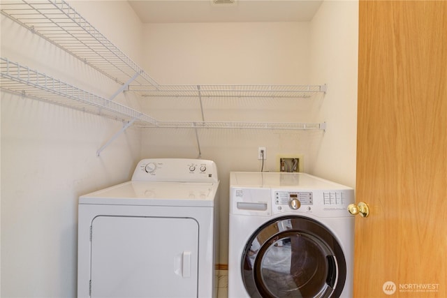 5511 152nd St SE, Everett, WA 98208 - laundry area featuring independent washer and dryer