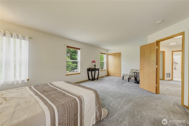 5511 152nd St SE, Everett, WA 98208 - bedroom featuring light colored carpet, a closet, and baseboards