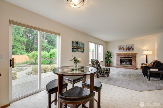 5511 152nd St SE, Everett, WA 98208 - dining area featuring a fireplace and light marble finish floors