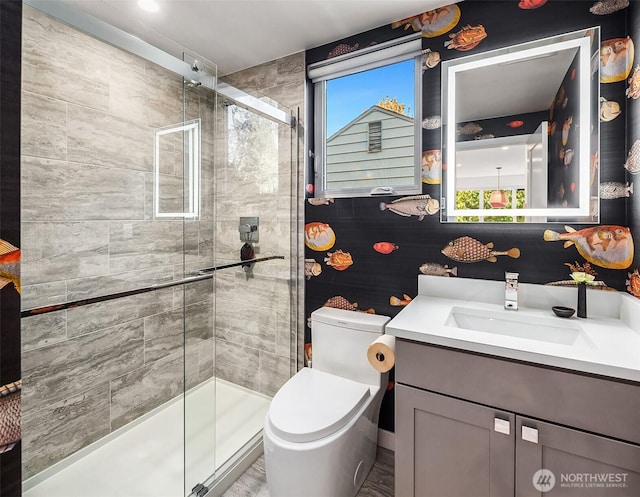 10419 41st Ave SW Unit A, Seattle, WA 98146 - full bathroom with a stall shower, vanity, and toilet