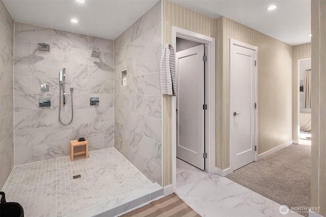 10419 41st Ave SW Unit A, Seattle, WA 98146 - bathroom featuring a tile shower, marble look tiles, recessed lighting, and baseboards