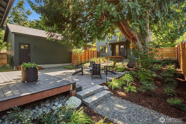 10419 41st Ave SW Unit A, Seattle, WA 98146 - view of patio / terrace featuring fence and a deck