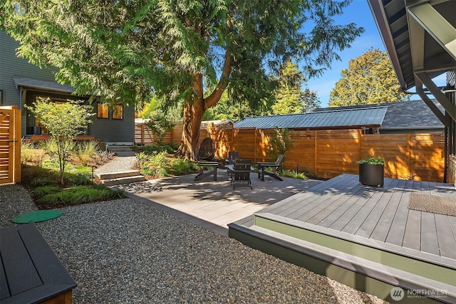 10419 41st Ave SW Unit A, Seattle, WA 98146 - wooden deck featuring a fenced backyard